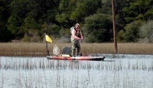 standing-in-a-kayak-to-fish